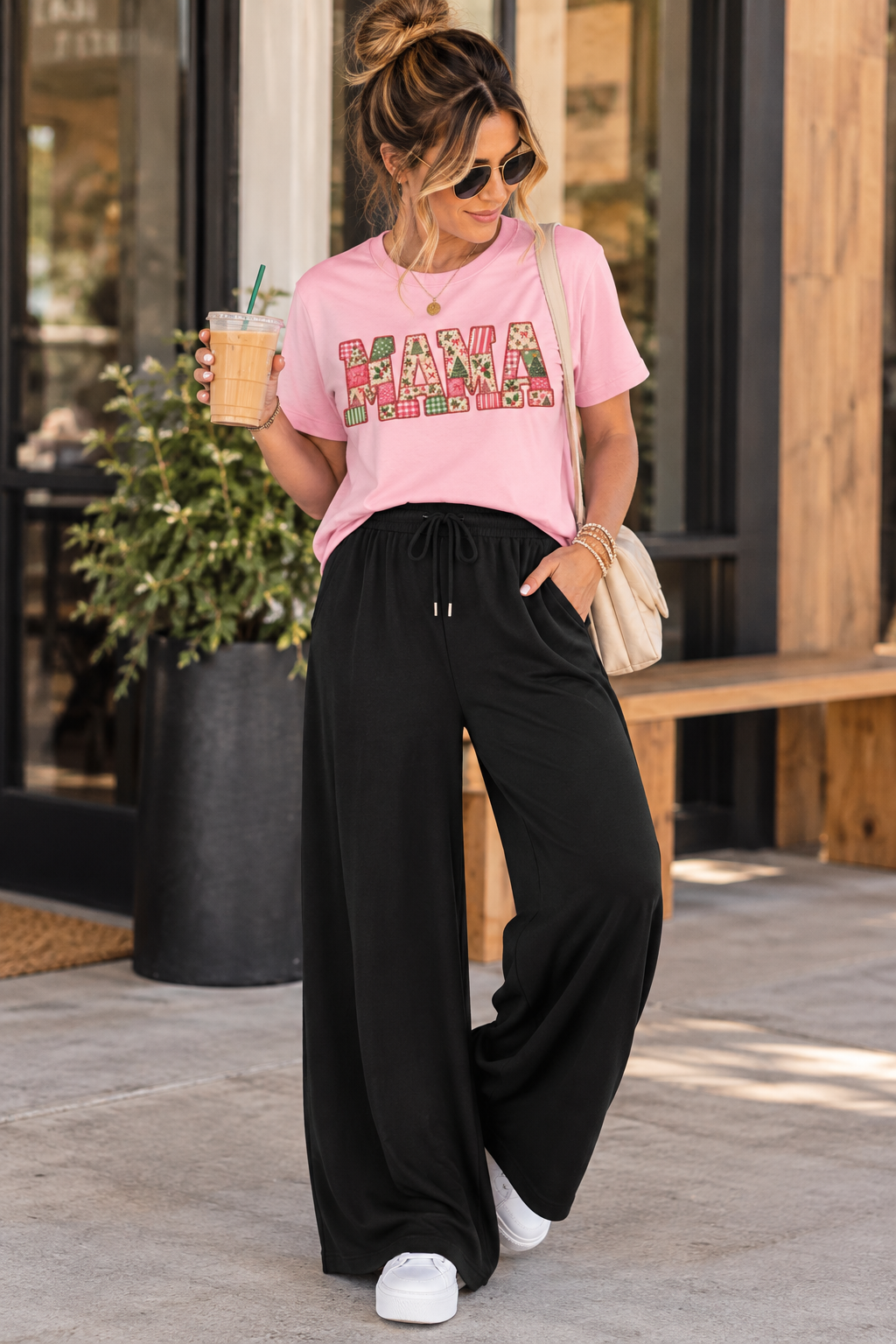 ChalkboardxChaos black wide-leg lounge pants with drawstring waist worn with a pink graphic tee and white sneakers
