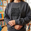 ChalkboardxChaos charcoal grey sweatshirt with Cool Teachers Club retro embroidery and personalized wrist text