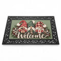 ChalkboardxChaos holiday welcome door mat featuring three whimsical gnomes on a sage green background with black frame