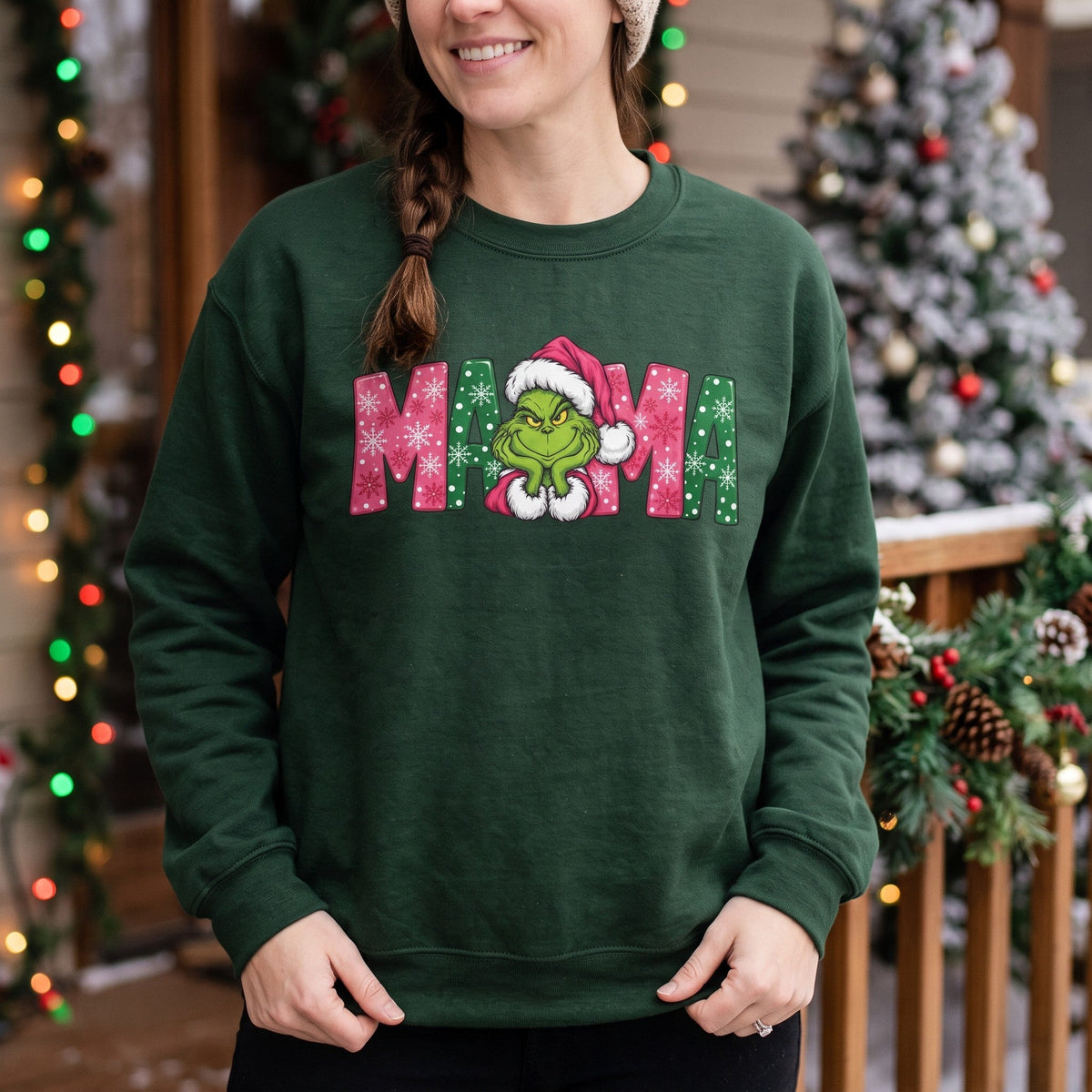 ChalkboardxChaos green Grinch MAMA Christmas sweatshirt with pink and green snowflake lettering and Santa hat design.