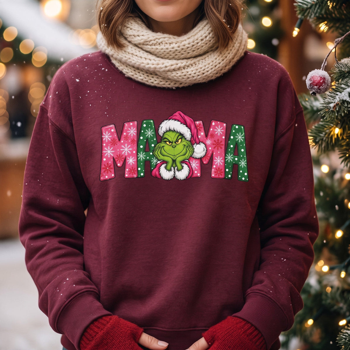 ChalkboardxChaos maroon sweatshirt featuring a Grinch MAMA graphic with pink and green snowflake lettering.