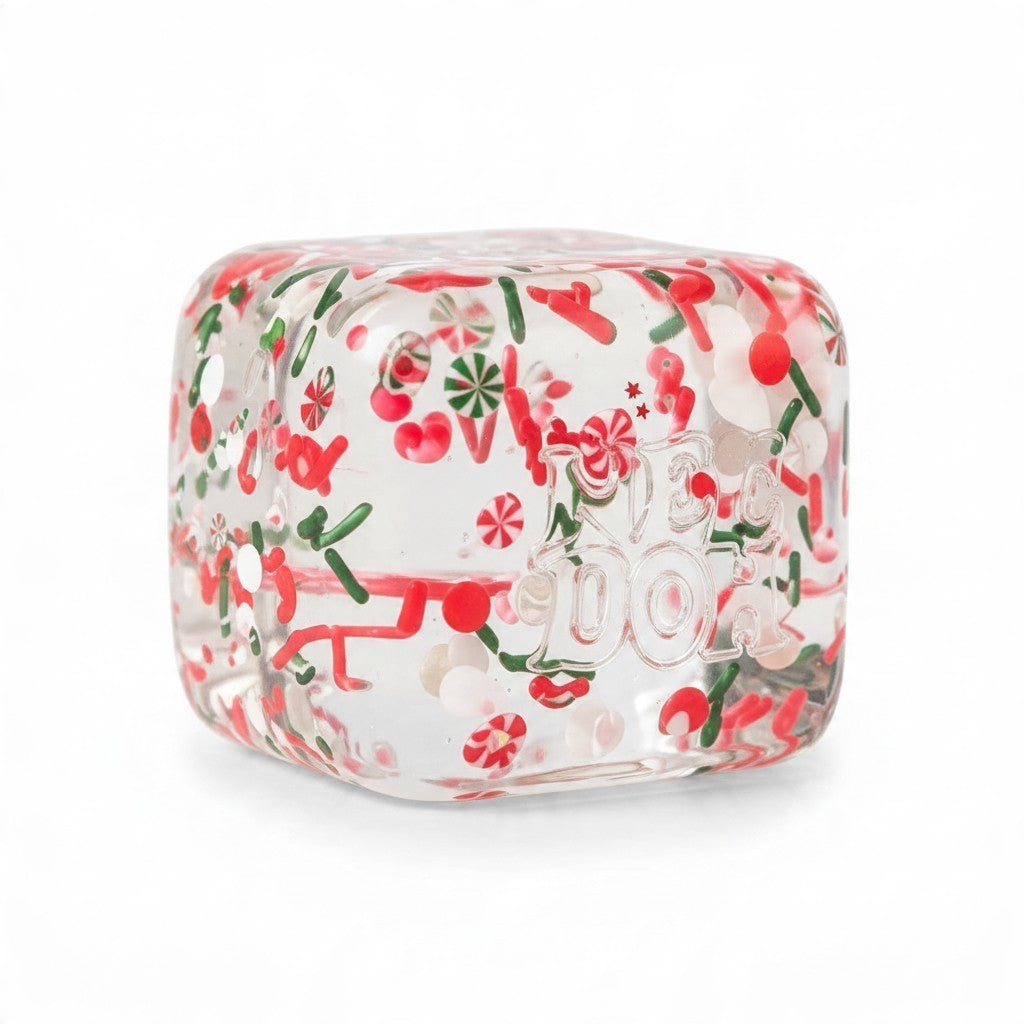 ChalkboardxChaos NeeDoh Christmas Nice Cube sensory fidget toy with festive red, green, and white holiday candy details.