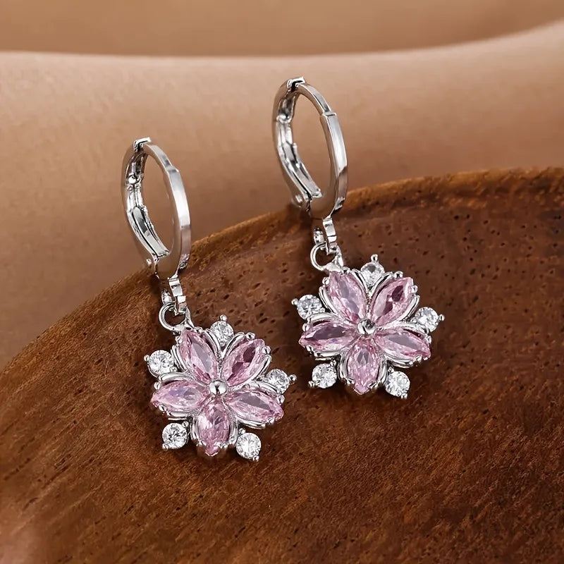 ChalkboardxChaos pink crystal flower drop earrings with marquise-cut stones and silver-tone hoop closures.