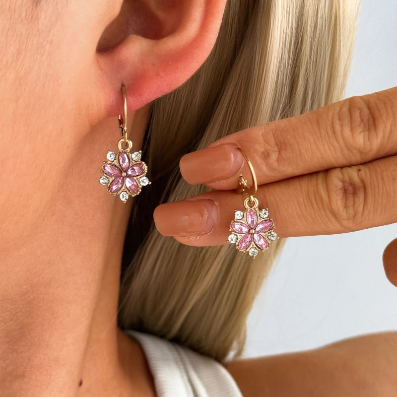 ChalkboardxChaos floral drop earrings featuring pink marquise-cut crystals and clear stone accents on a gold hoop.