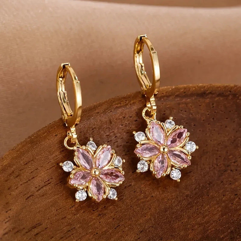 ChalkboardxChaos floral drop earrings featuring pink marquise-cut crystals and clear stones on gold-tone alloy hoops.