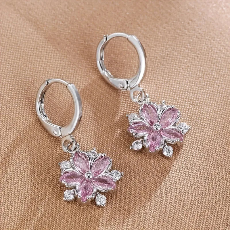 ChalkboardxChaos pink crystal flower drop earrings with marquise-cut stones and silver-tone hoop closures.