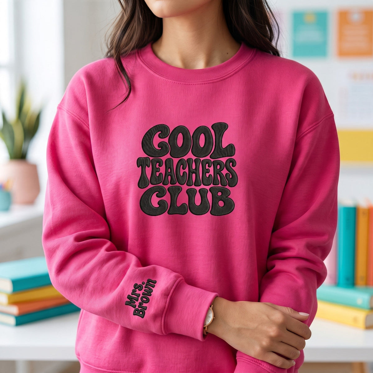 ChalkboardxChaos hot pink sweatshirt with Cool Teachers Club embroidered in black retro bubble font and wrist name