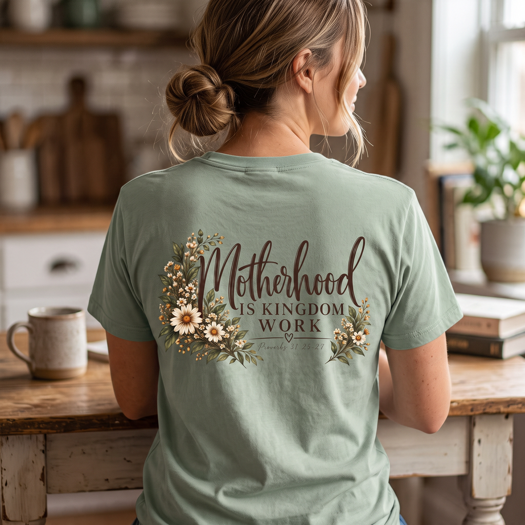 ChalkboardxChaos sage green Christian graphic tee with botanical floral design and Motherhood Is Kingdom Work text