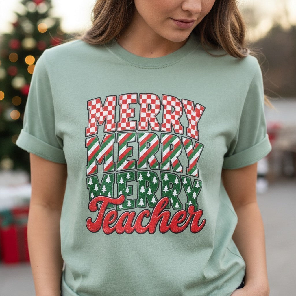 ChalkboardxChaos sage green Comfort Colors teacher Christmas t-shirt with retro Merry Merry Merry graphic print