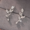 ChalkboardxChaos silver-tone crystal branch earrings with marquise-shaped stones in a nature-inspired design